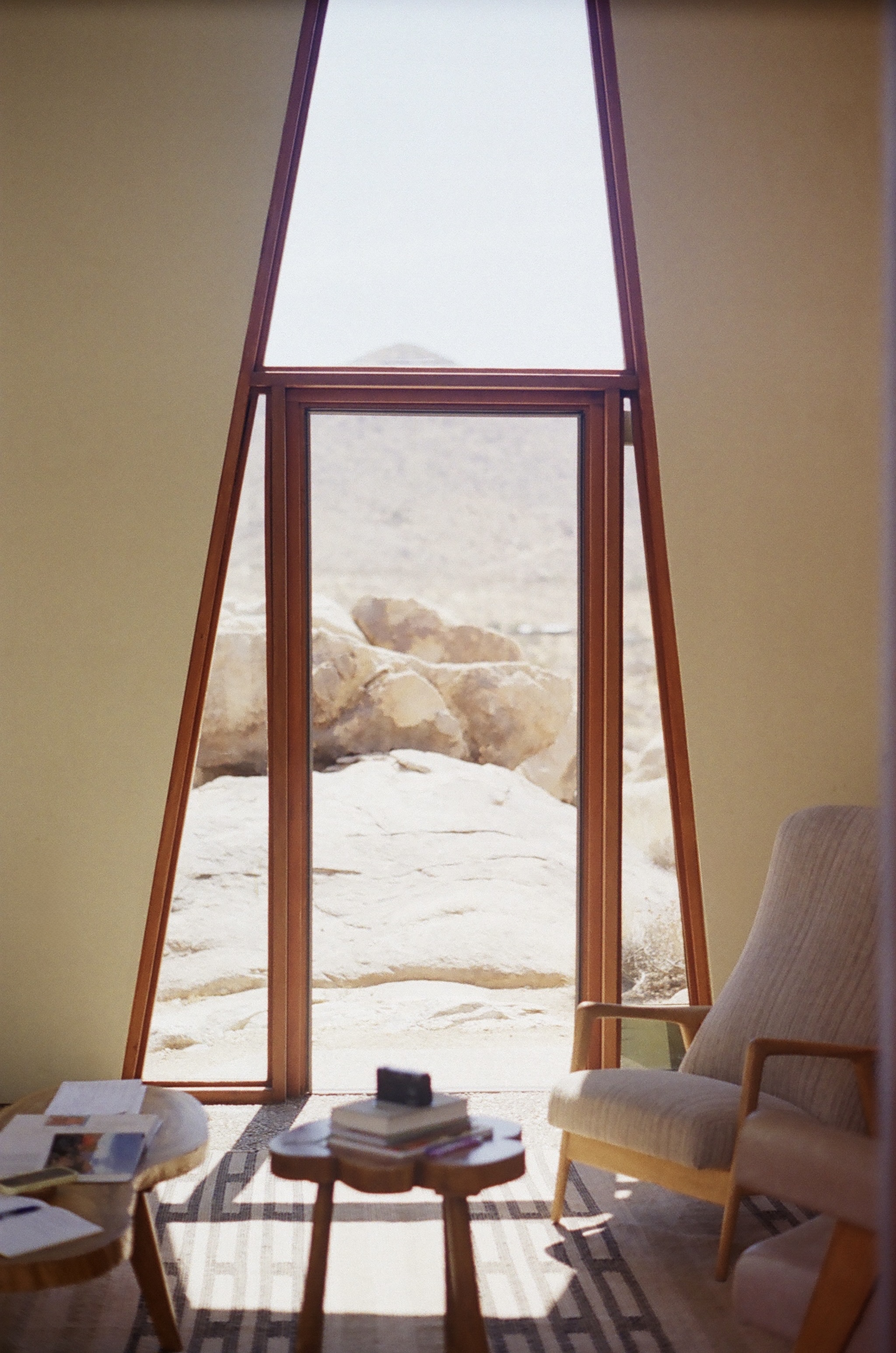 Monument House — Interior through trapezoidal door frame